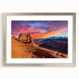 Textured art of Arches National Park in muted earth tones on a framed canvas, suitable for bedroom decor.