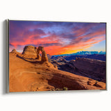 Framed canvas landscape art painting depicting Arches National Park in Utah, featuring earth tones with a silver frame.