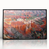 Large abstract wall art depicting Bryce Canyon in muted earth tones, framed in black acrylic.