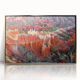 Large art print of Bryce Canyon in Utah on a framed acrylic, featuring earthy red and orange tones.