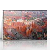 Acrylic print of Bryce Canyon in pastel shades, framed in white, ideal for modern art wall decor in a nursery.