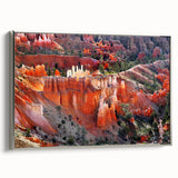 Framed canvas of Bryce Canyon landscape art painting in vibrant oranges and reds, ideal for a living room or study.