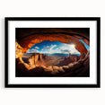 Abstract art print of Canyonlands with vibrant orange and red hues on a textured canvas, framed in black.