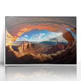 Acrylic print of Canyonlands National Park with muted earth tones, framed in white, suitable for modern art wall decor.