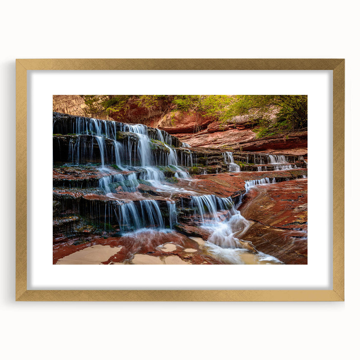 Extra large abstract art print of Zion scenery in gold frame, featuring textured brush strokes in earth tones.