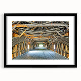 Abstract art print of vibrant, colorful scenery depicting Vermont, in a black frame with mat, ideal for living room decor.