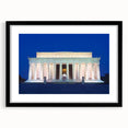 Colorful abstract art print of the Washington DC Lincoln Memorial, in vibrant hues on a textured canvas, framed in black.