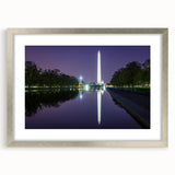Textured art print depicting the Washington DC skyline in muted gray and silver tones, framed with a silver mat.