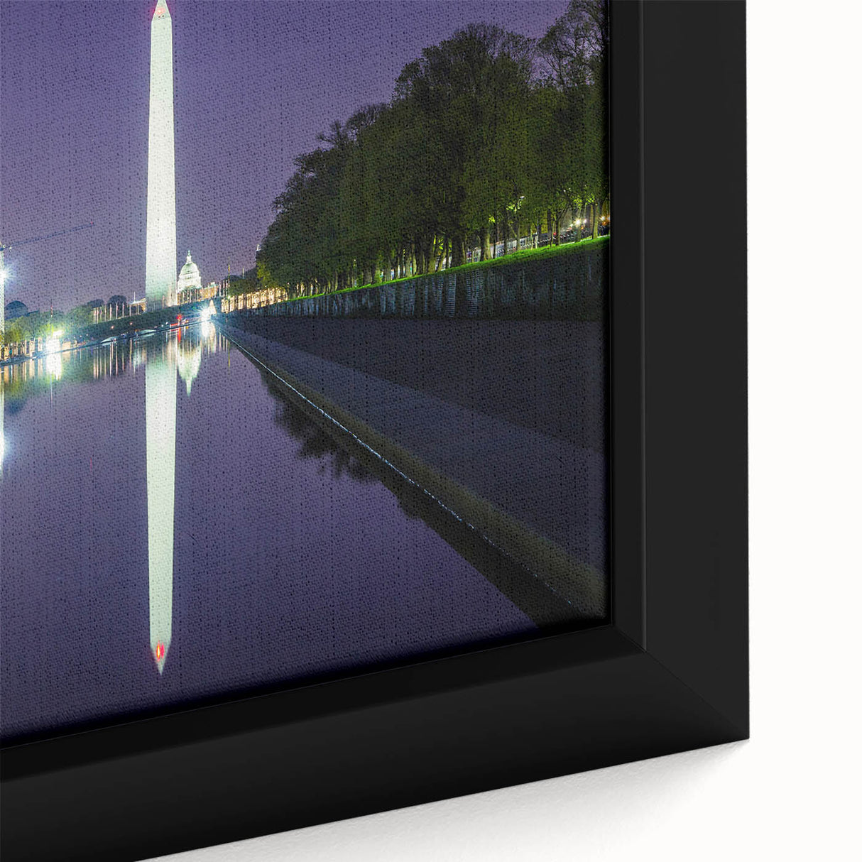 Black wall art featuring a textured depiction of the Washington DC monument in vibrant colors on a framed canvas.