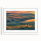 Abstract art print of Palouse, Washington in soft earth tones on a framed white mat, ideal for dining room decor.