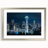 Textured art print of abstract Seattle skyline in muted gray tones, framed in silver, ideal for bedroom wall decor.