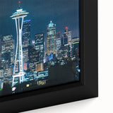 Framed canvas of Seattle skyline in black with textured, colorful accents, suitable for large living room walls.