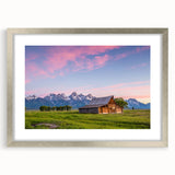 Textured art print of the Grand Tetons in Wyoming, featuring abstract elements and a silver frame.