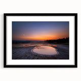 Extra large abstract art print of Yellowstone scenery in vibrant colors on textured canvas, framed in black.