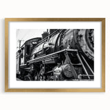 Extra large abstract art print featuring textured patterns in gold and black, framed with a mat, ideal for living room decor.