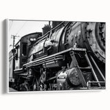 Vintage poster art featuring colorful, stylized vehicles on a large framed canvas, ideal for living room decor.