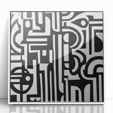 Framed acrylic artwork with an abstract geometric design in white, showcasing sharp angles and a modern aesthetic, suitable for contemporary home decor.