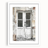 Abstract art print of a rustic Italian door in muted earth tones on a framed canvas, ideal for dining room decor.