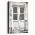Black and white framed canvas of a rustic Italian door, ideal for vintage bedroom decor.