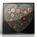 Framed acrylic wall art showcasing vibrant floral and botanical designs with lush green leaves, set in a sleek black frame, perfect for modern home decor.