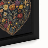 Framed canvas wall art showcasing a vibrant floral design with intricate leaves, perfect for home decor, adding a touch of nature and color to any room.