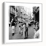 Vintage poster art of a bustling market scene on a framed canvas, featuring colorful art in a large format.