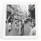 Black and white stretched canvas featuring a bustling market scene, ideal for kitchen wall art.