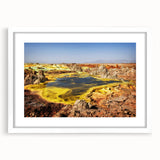 Extra large abstract art print of an Ethiopian landscape in textured hues of orange and brown, framed with a white mat.