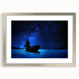 Abstract art print depicting a stylized African Mali scenery in silver frame, ideal for dining room decor.