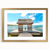 Textured abstract art print depicting a serene Mauritius landscape in muted earth tones, framed in gold.