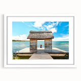 Extra large abstract art print depicting a textured African scenery in muted earth tones, framed with a white mat.