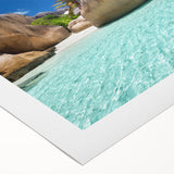 Art deco poster of Seychelles scenery on rolled canvas, with vivid ocean blues and greens, ideal for dining room decor.