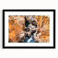 Extra large abstract art print depicting a vibrant, colorful African scenery, textured and framed in black.