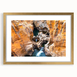 Extra large abstract art print of a textured African landscape in gold frame, ideal for living room decor.