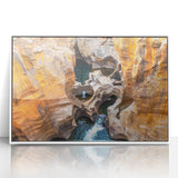 Acrylic print of a South African landscape in muted earth tones, framed in white, suitable as modern art wall decor.