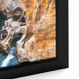 Extra large black wall art featuring a textured, colorful African landscape on framed canvas, ideal for living room decor.