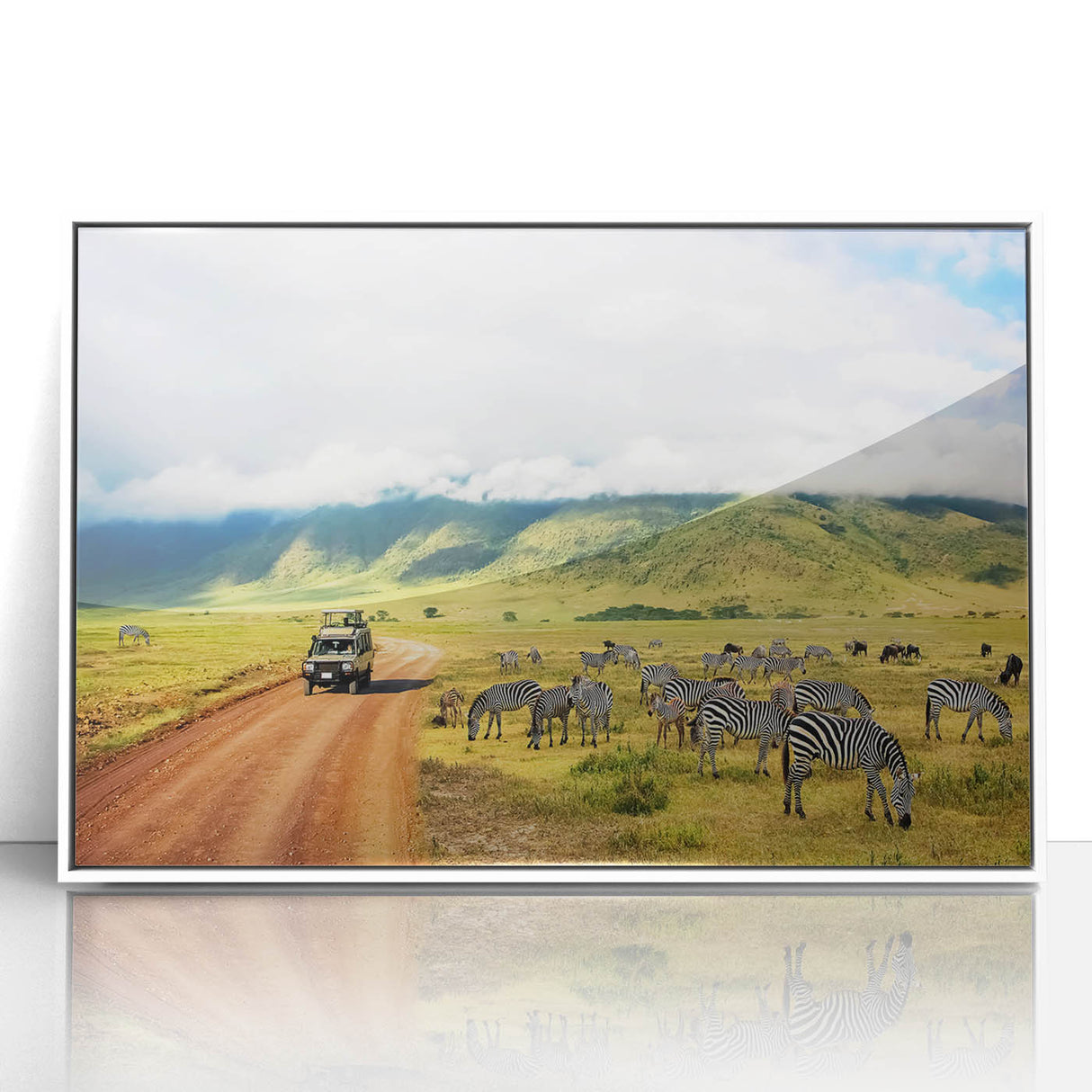 Acrylic print of a Tanzanian landscape framed in white, featuring muted earth tones, ideal for nursery wall art.