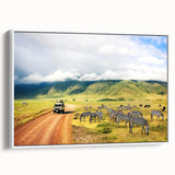 Vintage poster art of a Tanzanian scenery on framed canvas, featuring colorful artwork with black accents.
