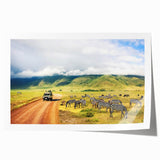 Rolled print of a serene Tanzanian landscape with lush greenery and a distant mountain, in earthy tones.