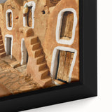 Extra large framed canvas featuring a textured black wall art of a Tunisian scenery in vibrant, colorful tones.