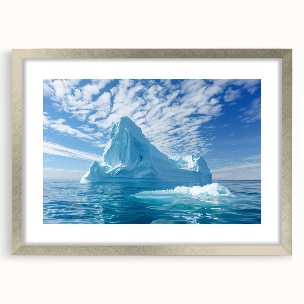 Textured abstract art print of an Antarctic landscape in muted blue and white tones, framed in silver.