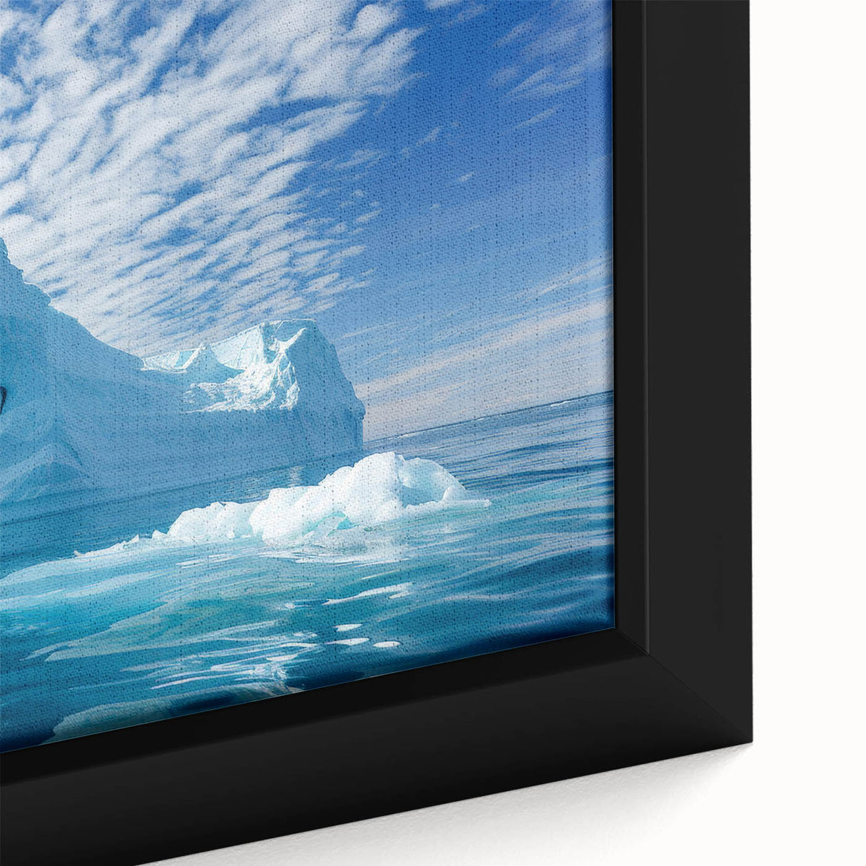 Close-up of a textured black wall art featuring an Antarctic scenery on a framed canvas, ideal for living room decor.