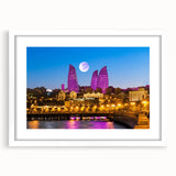 Abstract art print featuring muted earth tones of a landscape, framed in white, ideal for dining room decor.