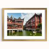 Extra large abstract art print of Shanghai skyline in muted gray and gold tones on a framed canvas.