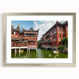 Textured art print of abstract Shanghai skyline in muted gray and blue tones on a framed canvas.