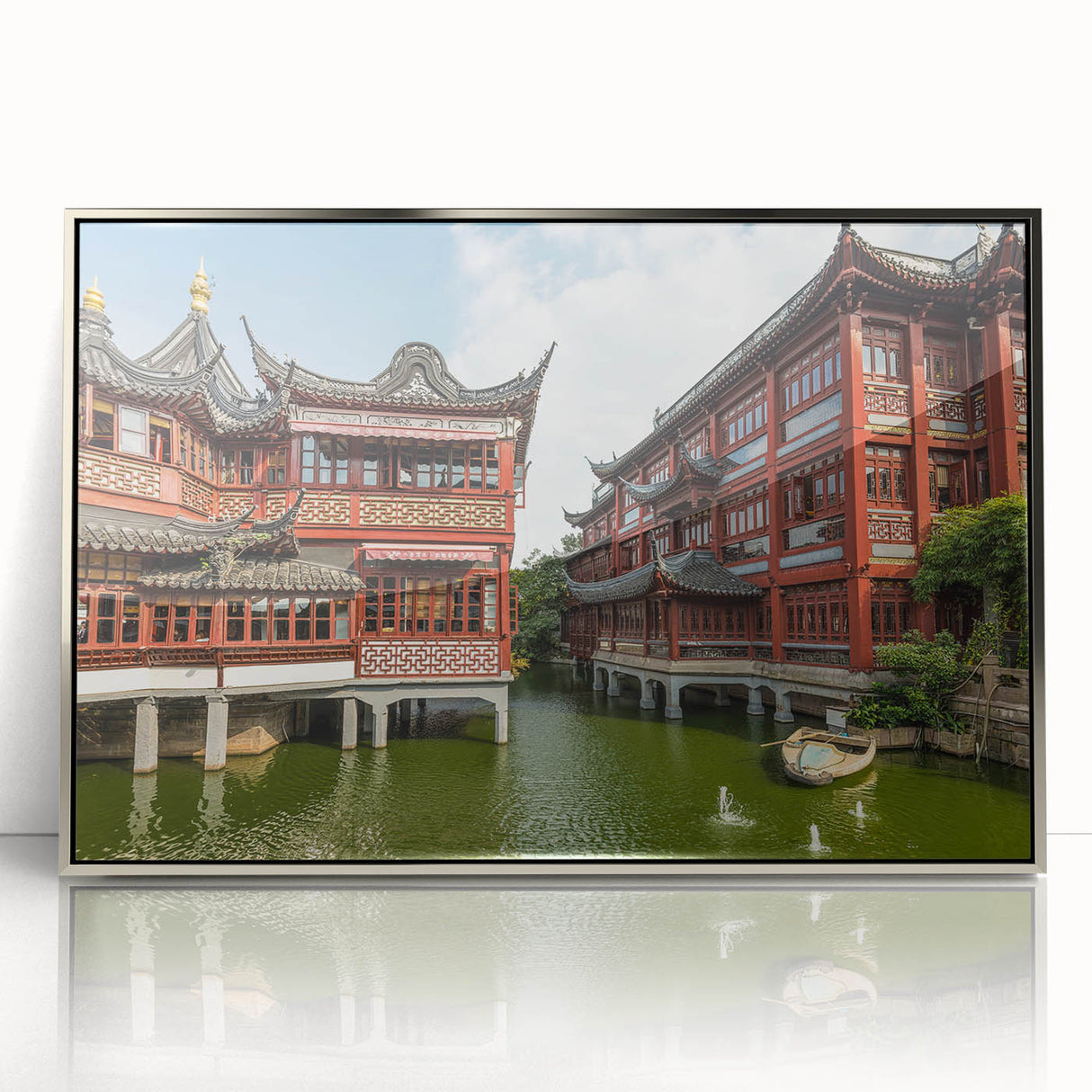 Mid-century modernist art of Shanghai skyline in muted silver and gray tones on framed acrylic.