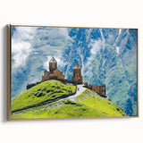 Framed canvas featuring a vintage-style landscape painting of the Georgian countryside, with muted gold and black tones.