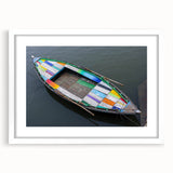 Abstract art print of Indian scenery in muted earth tones on a white matted frame, suitable for dining room decor.