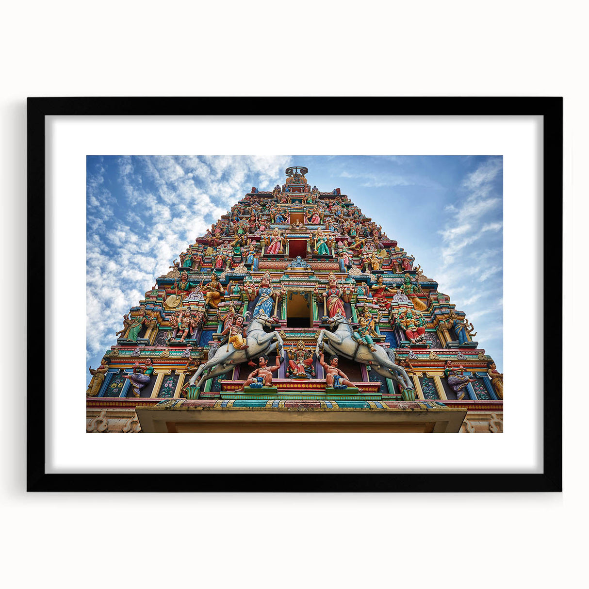 Extra large colorful abstract art print of a Malaysian landscape, textured on a black framed canvas.