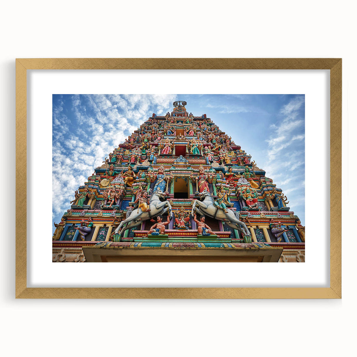 Extra large abstract art print of a Malaysian landscape in textured gold frame, ideal for living room decor.